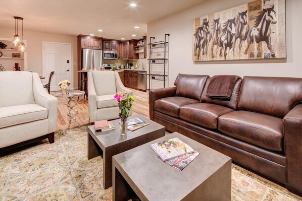 Living Room - comfortable seating and large flatscreen. Great for relaxing after a day on the mountain!