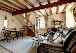 The comfortable lounge with reclining sofa and chairs