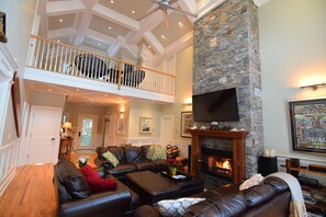 Gorgeous stone fireplace with fiber optic LED lighting.
