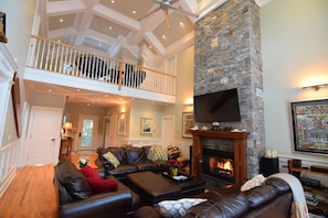 Gorgeous stone fireplace with fiber optic LED lighting.