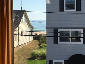 Ocean and beach views from one of the many windows in the living area