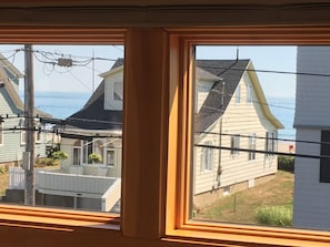 Ocean views from massive windows overlooking front of home