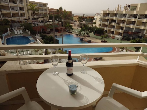 One bedroom studio with pool views. The apartment has 2 single beds and a sofa bed. The kitchen has a microwave, hob, kettle and toaster. The lounge has a TV and free Wifi with speeds up to 300 Mbps.