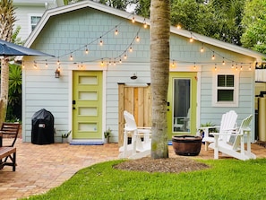 The Cottage is in the backyard of the Blue Bungalow. Left door is the entrance.
