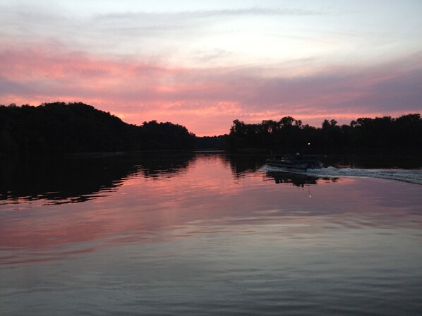 Boating into the sunset. Taken while sitting on the dock.