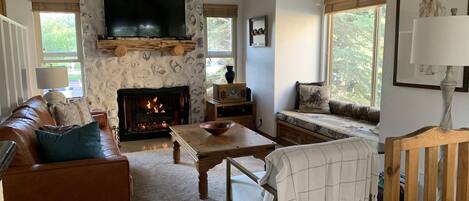 Cozy Family Room with Fireplace and Smart 50" TV and plenty of seating