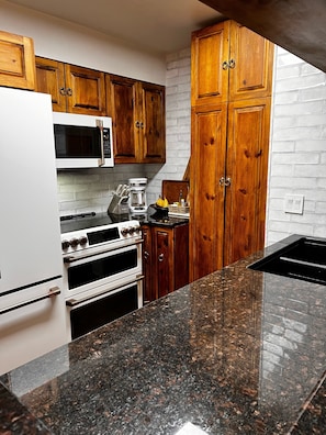 Newly remodeled Kitchen - dual oven, microwave, coffee pot etc. 