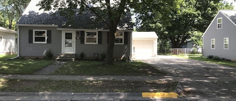 View of house from street. Brand new roof and siding.