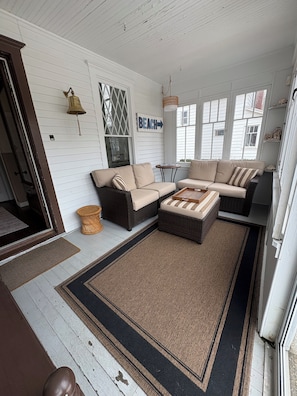 Tastefully decorated front porch for a warm relaxing feel
