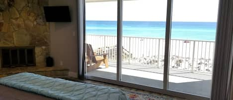 View from the Master Bedroom.  Large balcony with two Adirondack chairs.