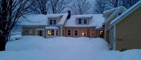 cozy house in winter eve