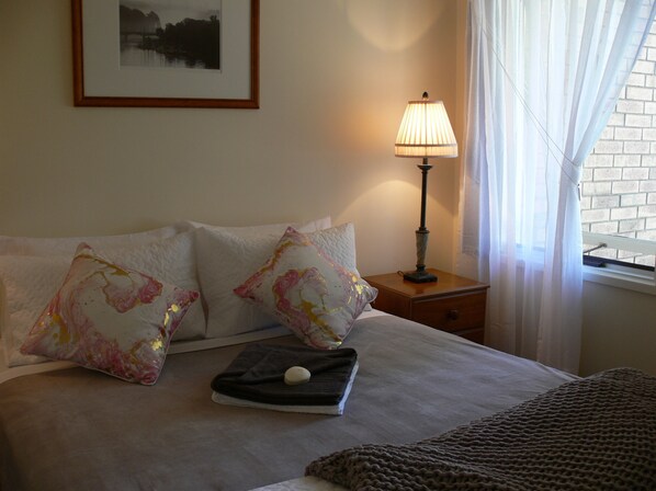 One bedroom with comfy queen size bed.