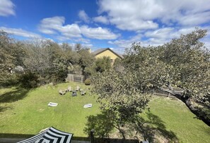 Treetop views from every upstairs space. This view from office is  panoramic