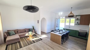 Living room, kitchen and dining area