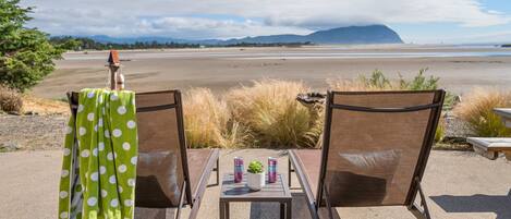 Lounge on the patio and watch the tide roll in