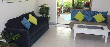 Quiet , cool comfort in the fully airconditioned Lounge, with patio access 