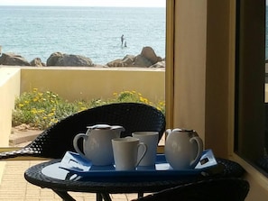 Tea looking over the sea