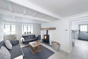 Light & cosy living area complete with sofa bed.