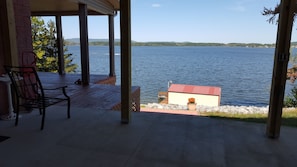 Photo of South Sauty Creek and boat house taken from carport and porch.