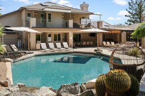 Private pool with loungers and seating