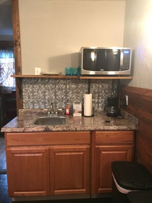 Small Kitchen with microwave and coffee pot