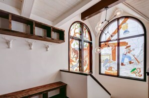 The original stained glass windows depict Park City's rich mining history