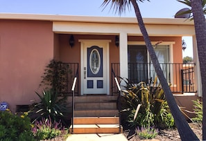 Well-maintained, tastefully decorated house with ample sunshine most afternoons.