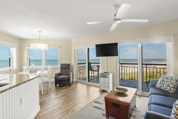 Living/Dining Area with Two Balcony Doors plus Windows Offering Expansive Views!