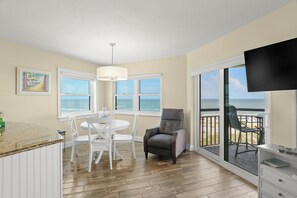 Living/Dining Area with Two Balcony Doors plus Windows Offering Expansive Views!