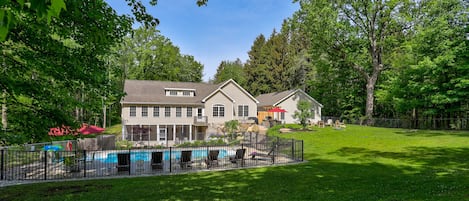 Fenced back yard and fenced pool area