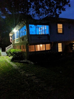 Night time view with ambient lighting on the screen in porch.