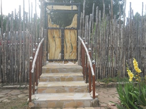 steps entering Casita's yard from parking lot