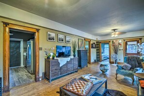 Gather as a group in the open living area in front of the large flat screen TV!