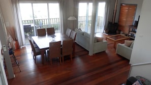 Living/dining area with beach views