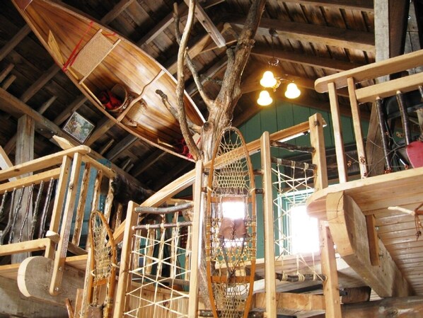 a magical loft hide-away with a tree spiral staircase