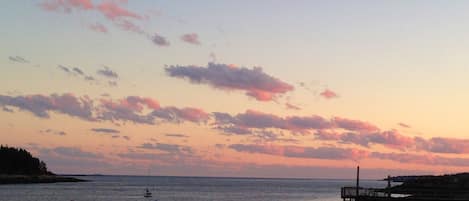 The setting sun on Lowell's Cove & the Atlantic ocean beyond.
