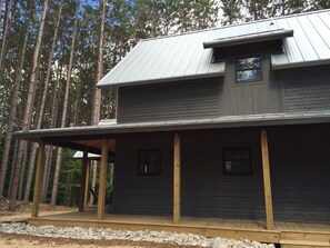 wrap around porch with metal roof