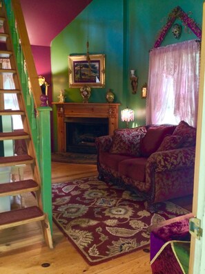 Living room with stairs to loft