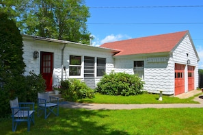 Side entrance from parking area and garage
