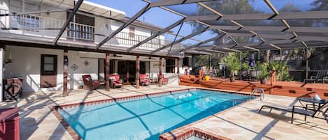 Salt water pool with solar heating, Sitting area and a Spa