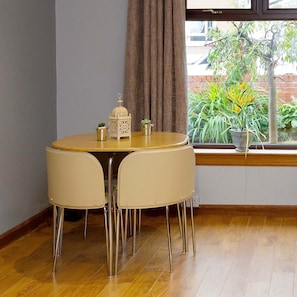 Dining area seating up to four guests