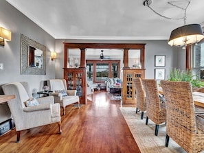 looking from kitchen through dining room/lounge into livingroom