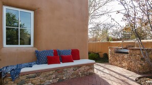 Front patio seating and grill area.