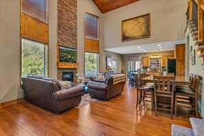 Large and open main living space with beautiful knotty pine ceilings!