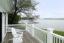 Enjoy Expansive Water Views from the Master Bedroom Deck