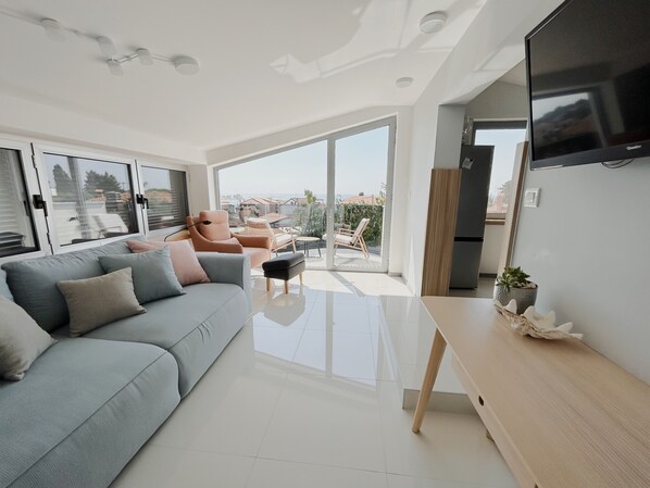 Living room with front terrace