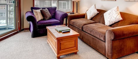 Living room with sofabed and gas fireplace