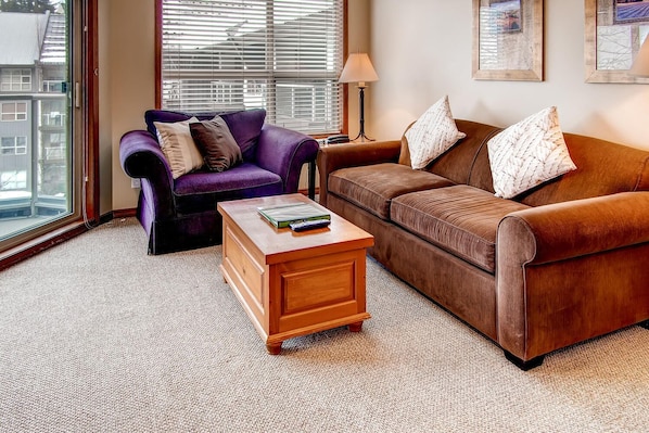 Living room with sofabed and gas fireplace