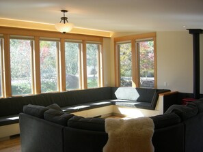 Living room looking out to peaceful park in cul de sac and dramatic mountains