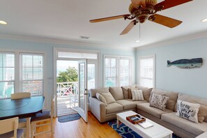 Large main living area with plenty of seating and Ocean views